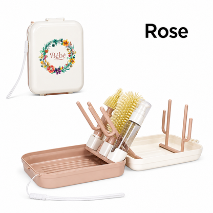 egouttoir biberon rose  ouvert sur table.