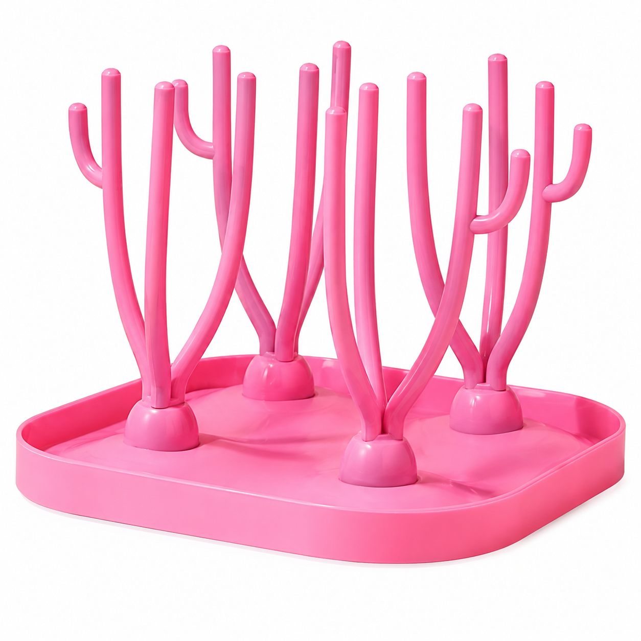 egouttoir biberon rose sur la table.