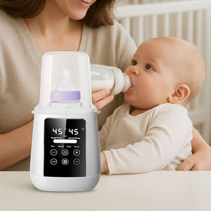 maman donne bebe souriant biberon chauffe dans chauffe biberon.