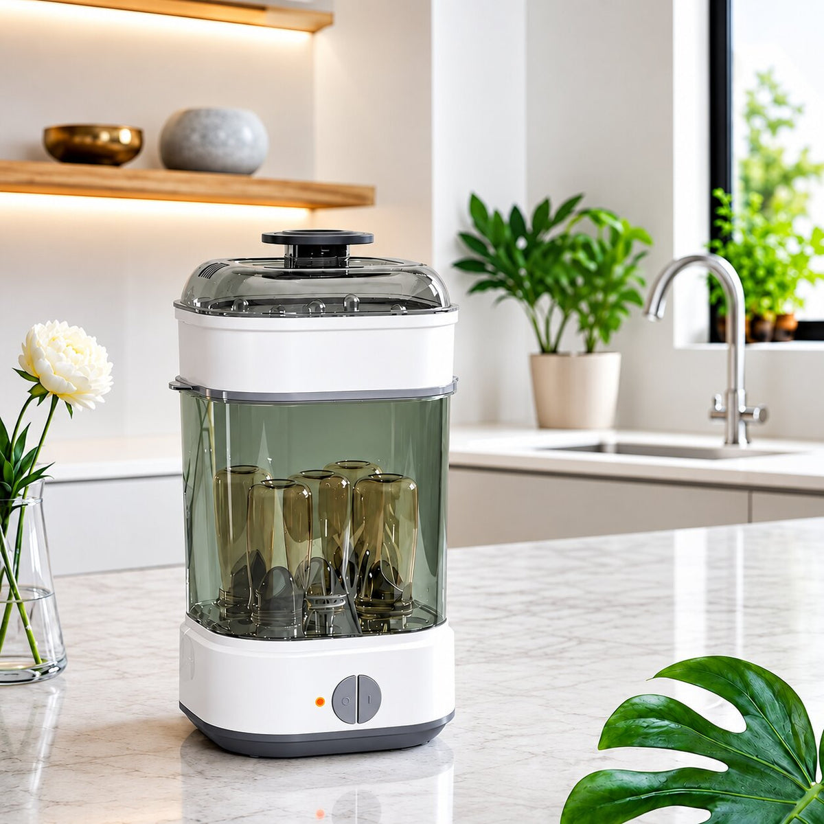 sterilisateur electrique biberon moderne  blanc sur comptoir en marbre